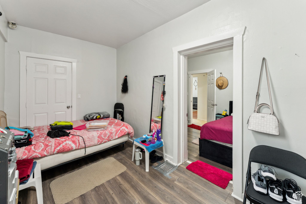 Bedroom featuring wood finished floors