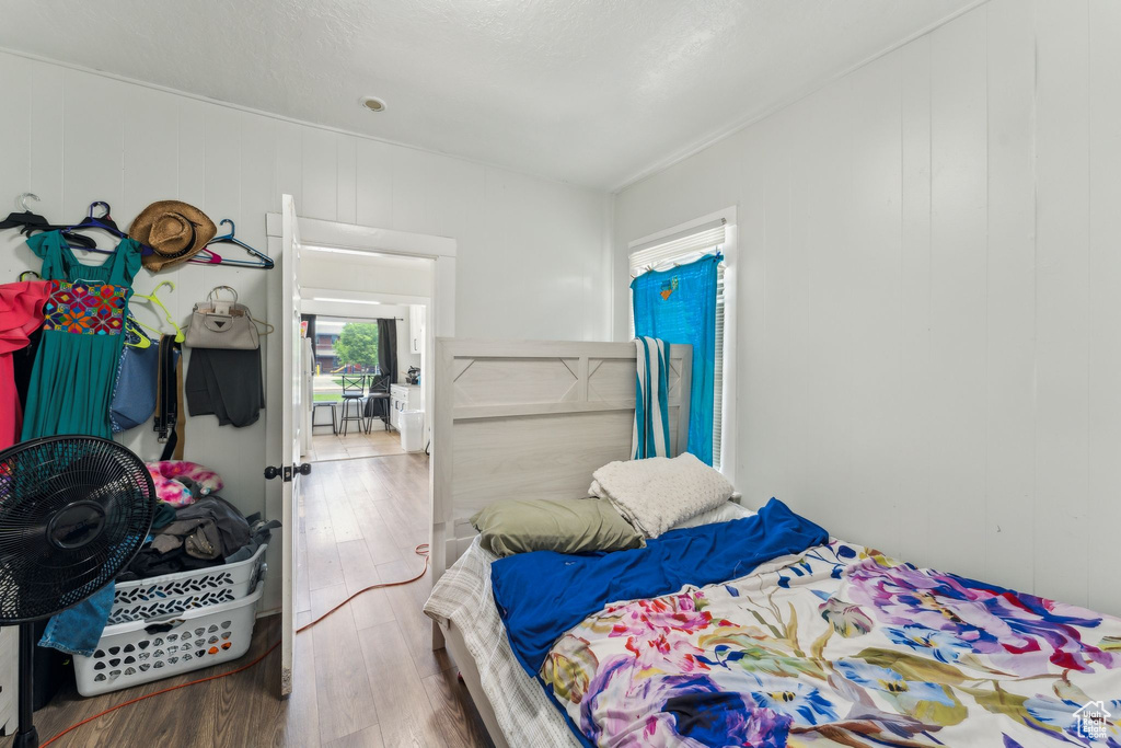 Bedroom featuring wood finished floors