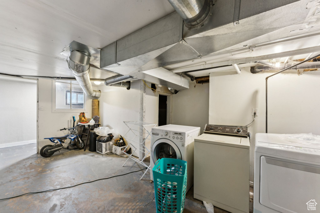 Below grade area with independent washer and dryer