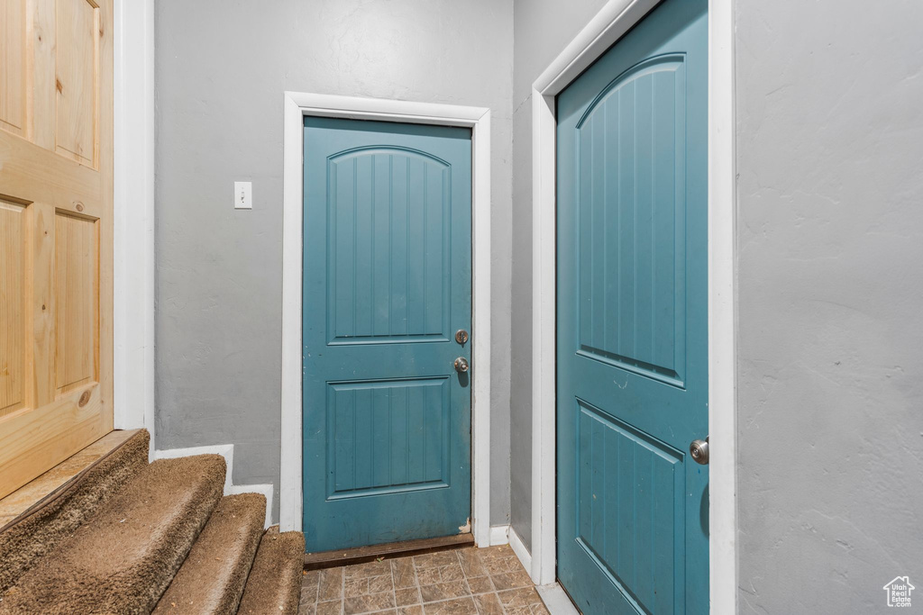 Foyer with baseboards