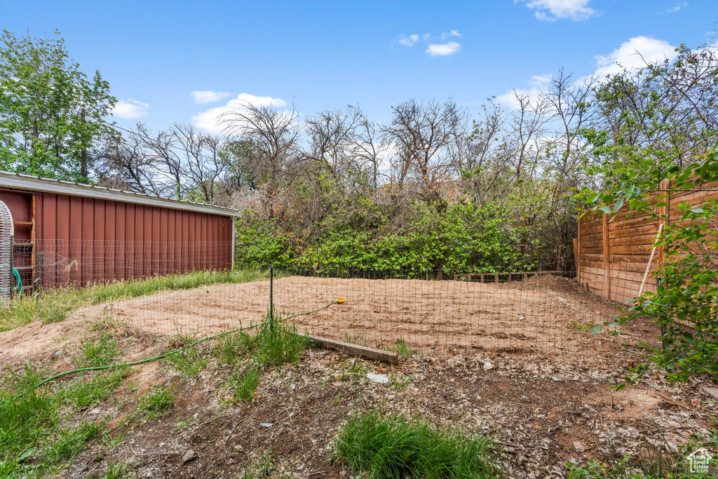 View of yard with fence