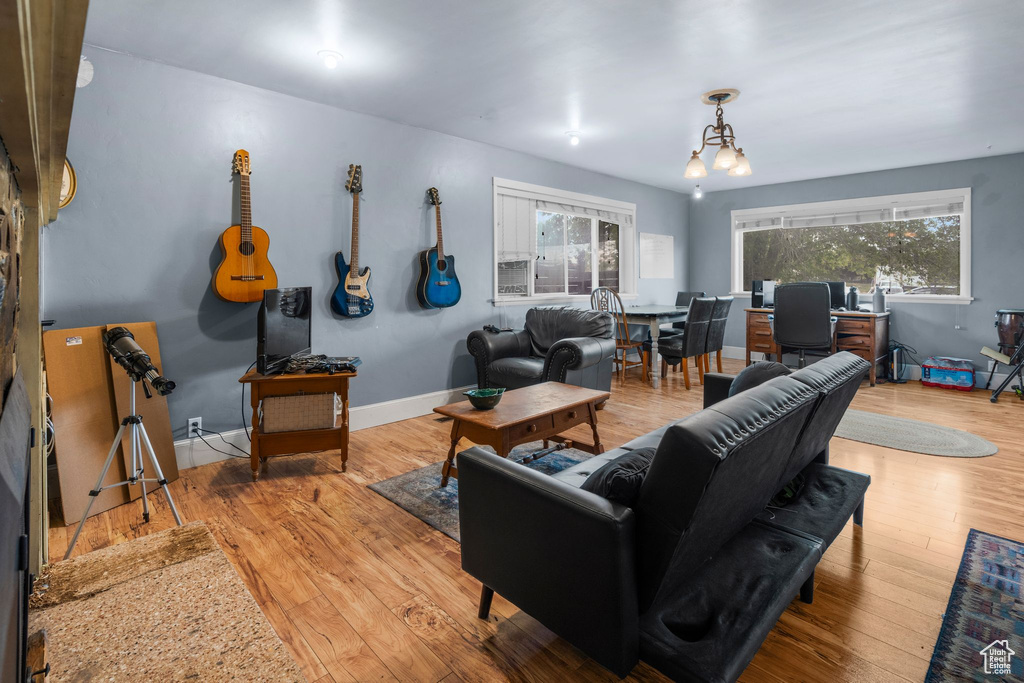 Living room featuring wood finished floors and baseboards