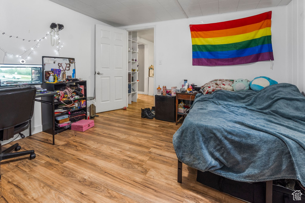 Bedroom featuring wood finished floors