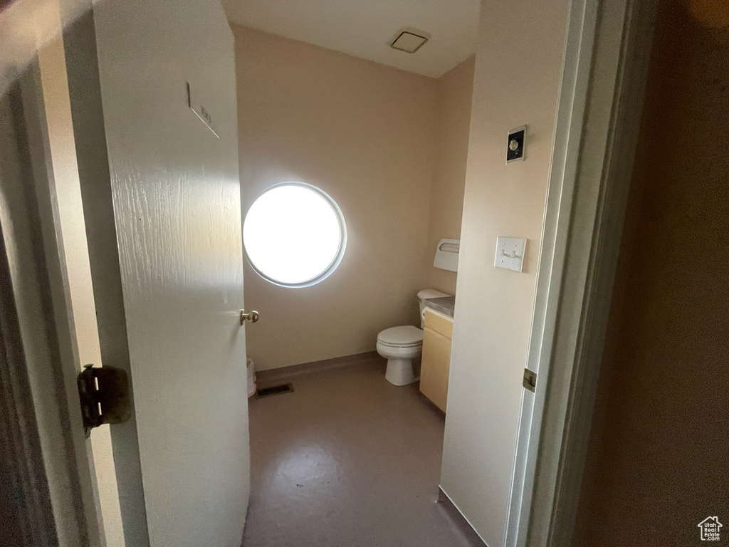 Bathroom with vanity and toilet