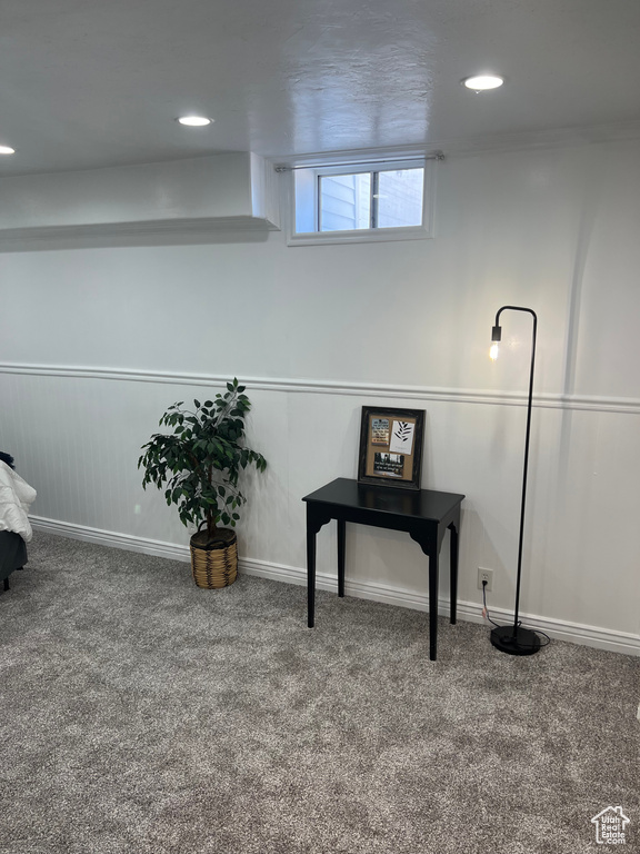 Below grade area with carpet floors and recessed lighting