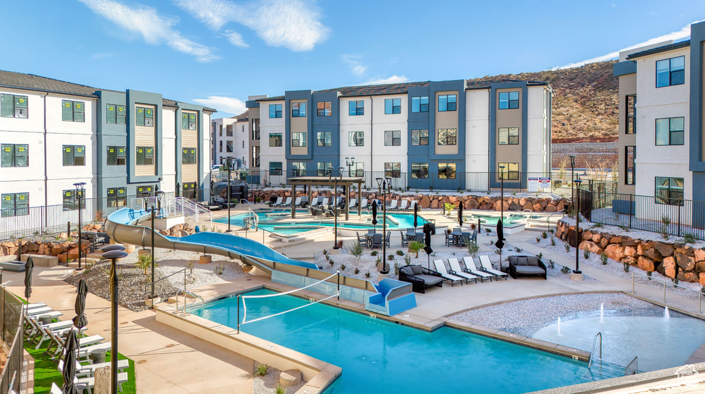 Community pool with a patio area