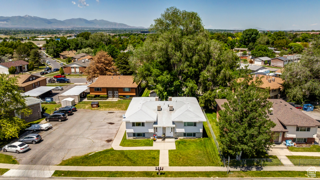 Aerial view of residential area with mountains