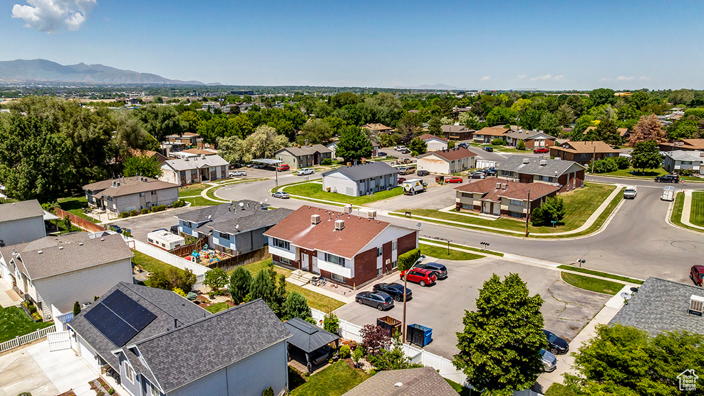 Aerial view of residential area with a mountain backdrop