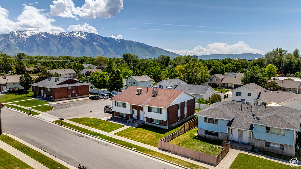 Aerial view of residential area with mountains