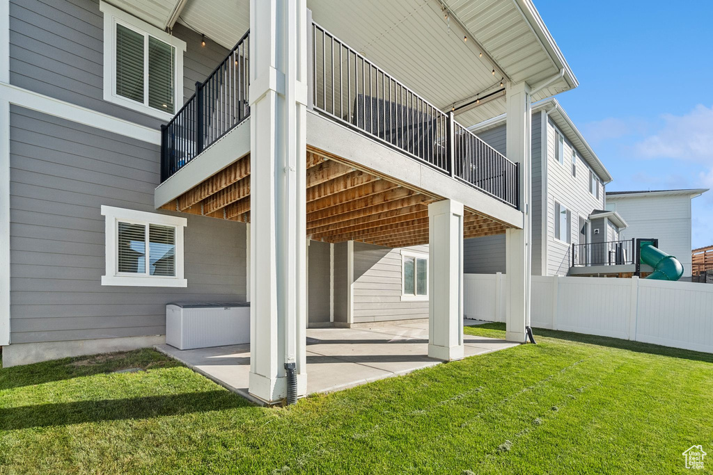 View of side of property featuring a patio area