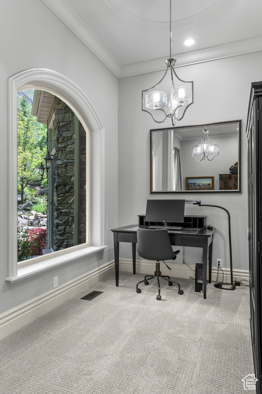 Carpeted office featuring a chandelier, baseboards, and ornamental molding