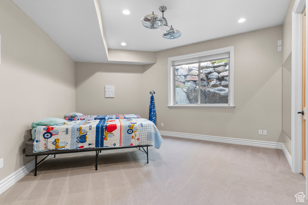 Bedroom with carpet floors, baseboards, and recessed lighting