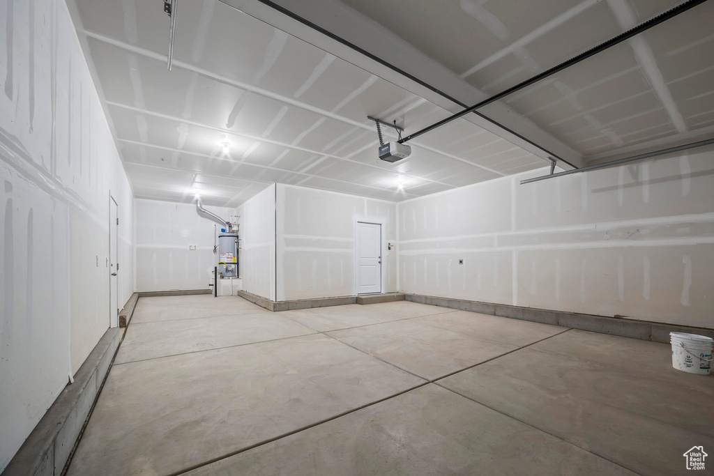 Garage with strapped water heater