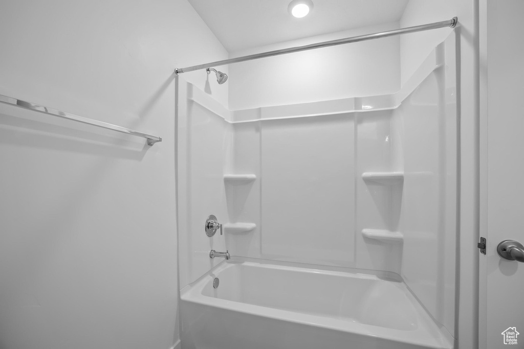 Full bath featuring shower / bath combination