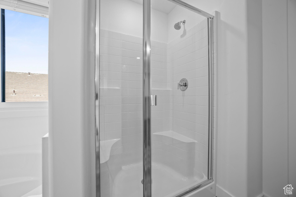 Full bathroom with a stall shower