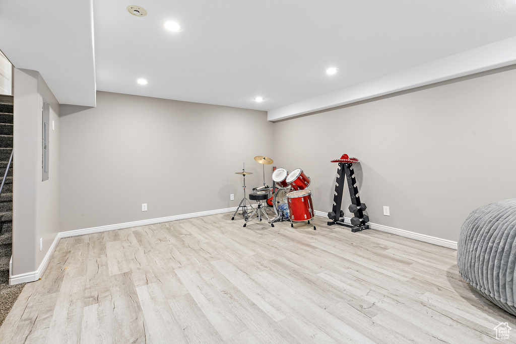 Playroom featuring light wood-style floors, recessed lighting, and baseboards