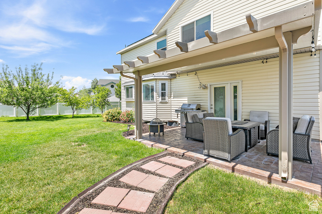View of yard with a patio area