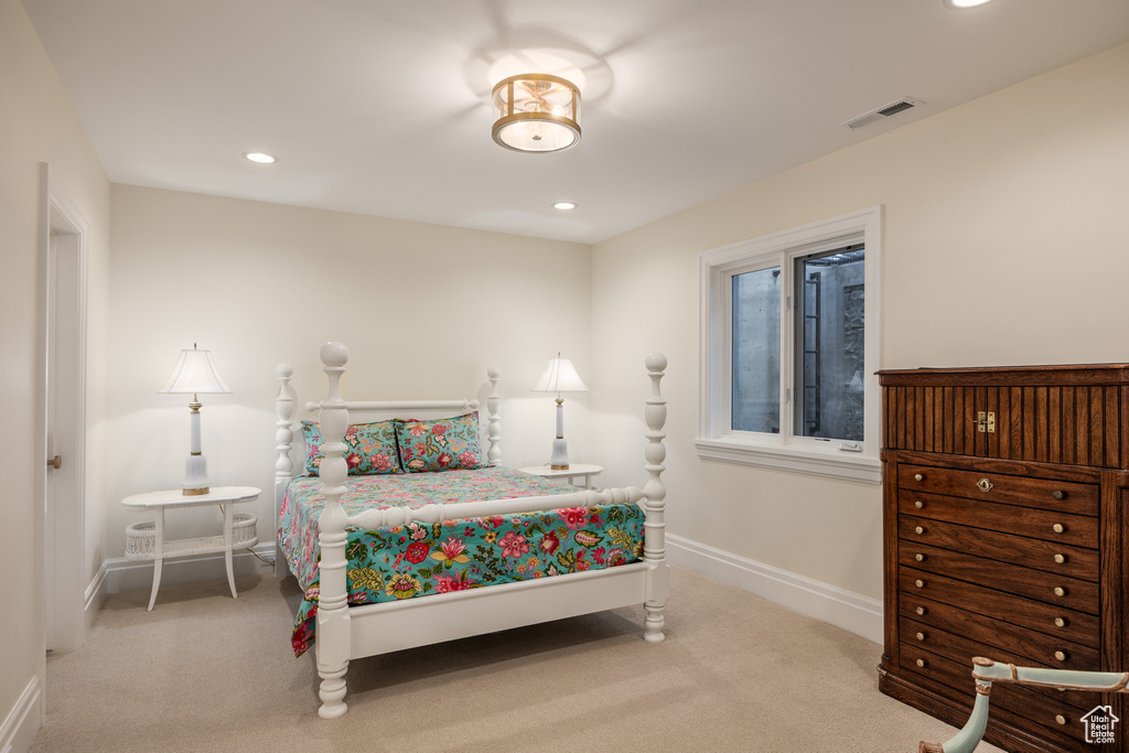 Bedroom featuring carpet flooring, baseboards, and recessed lighting