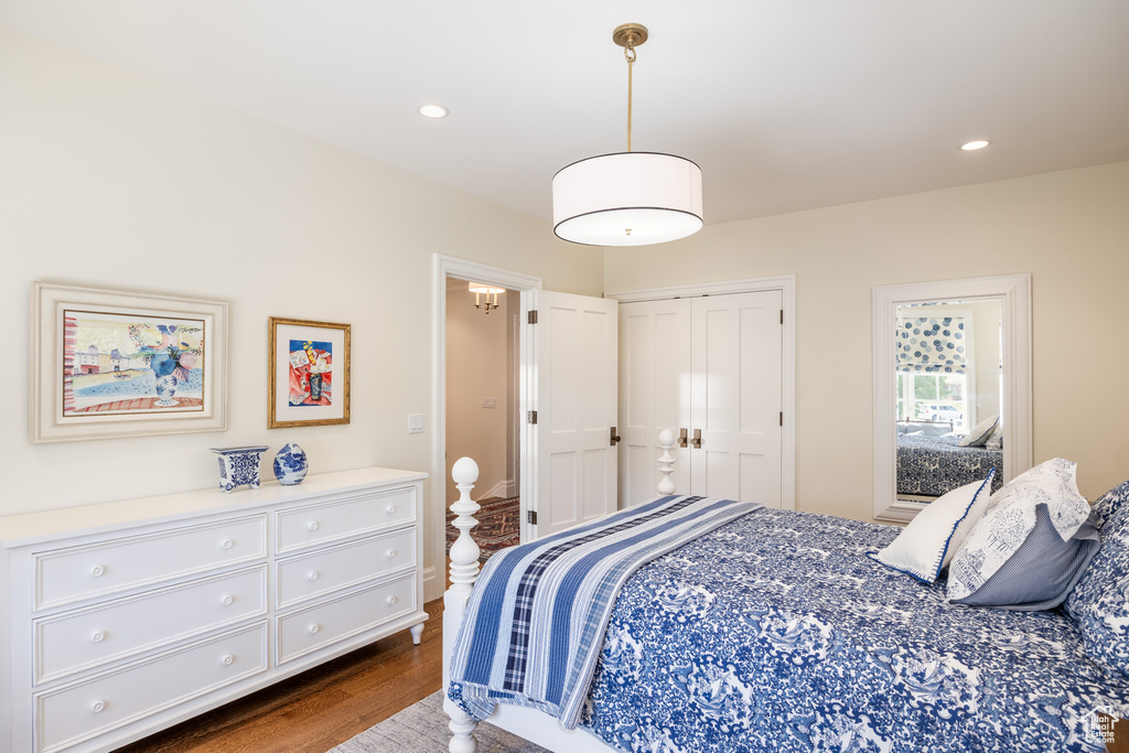 Bedroom with dark wood-type flooring and recessed lighting