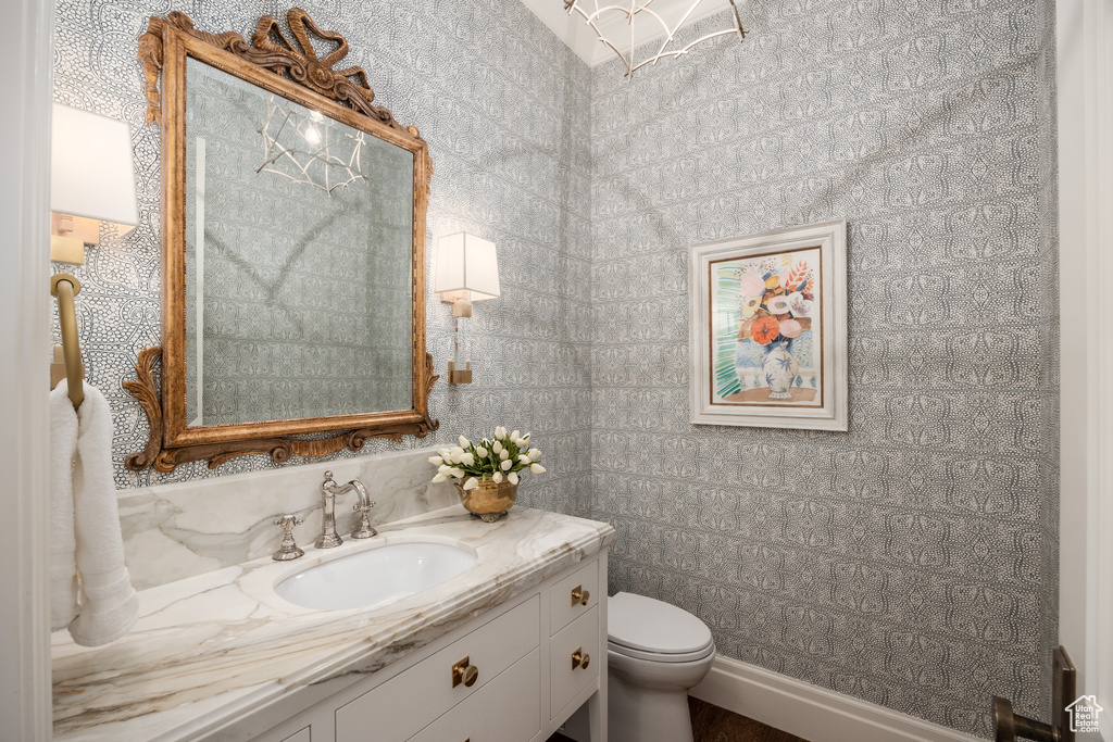 Bathroom with vanity and toilet
