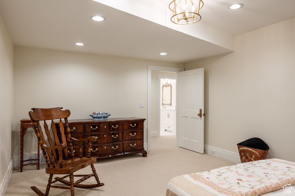Living area with carpet floors, recessed lighting, baseboards, and a chandelier