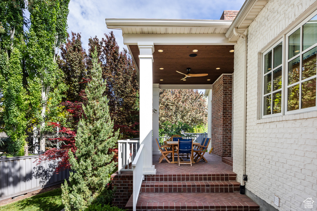 View of patio featuring ceiling fan and outdoor dining space