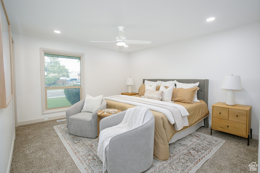 Carpeted bedroom featuring recessed lighting, baseboards, and ceiling fan
