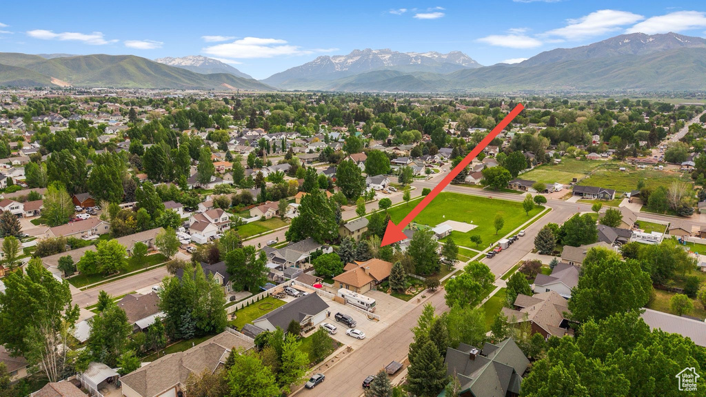 Aerial view of residential area with mountains