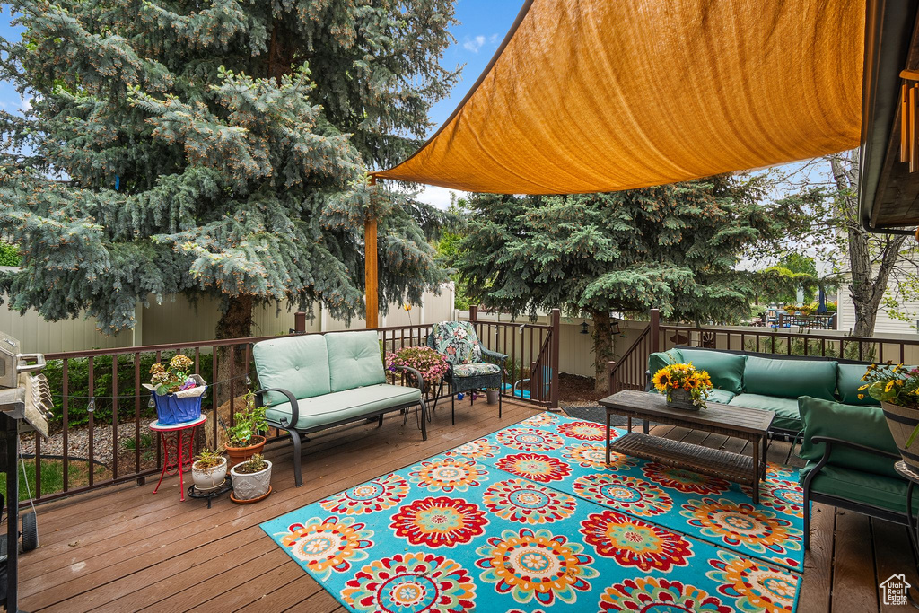Wooden deck with an outdoor hangout area