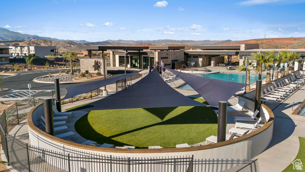 Community pool featuring a mountain view