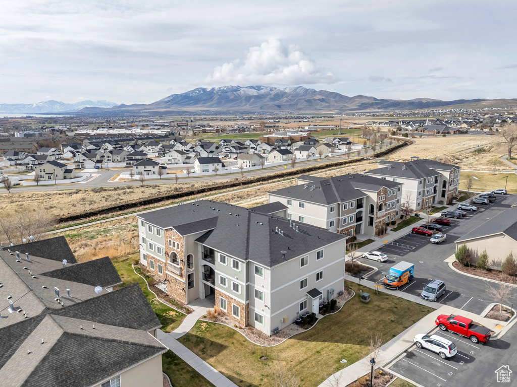 Aerial view of residential area with a mountainous background