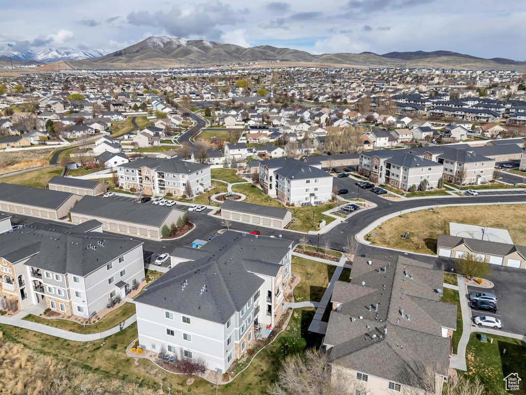 Aerial view of residential area with a mountainous background