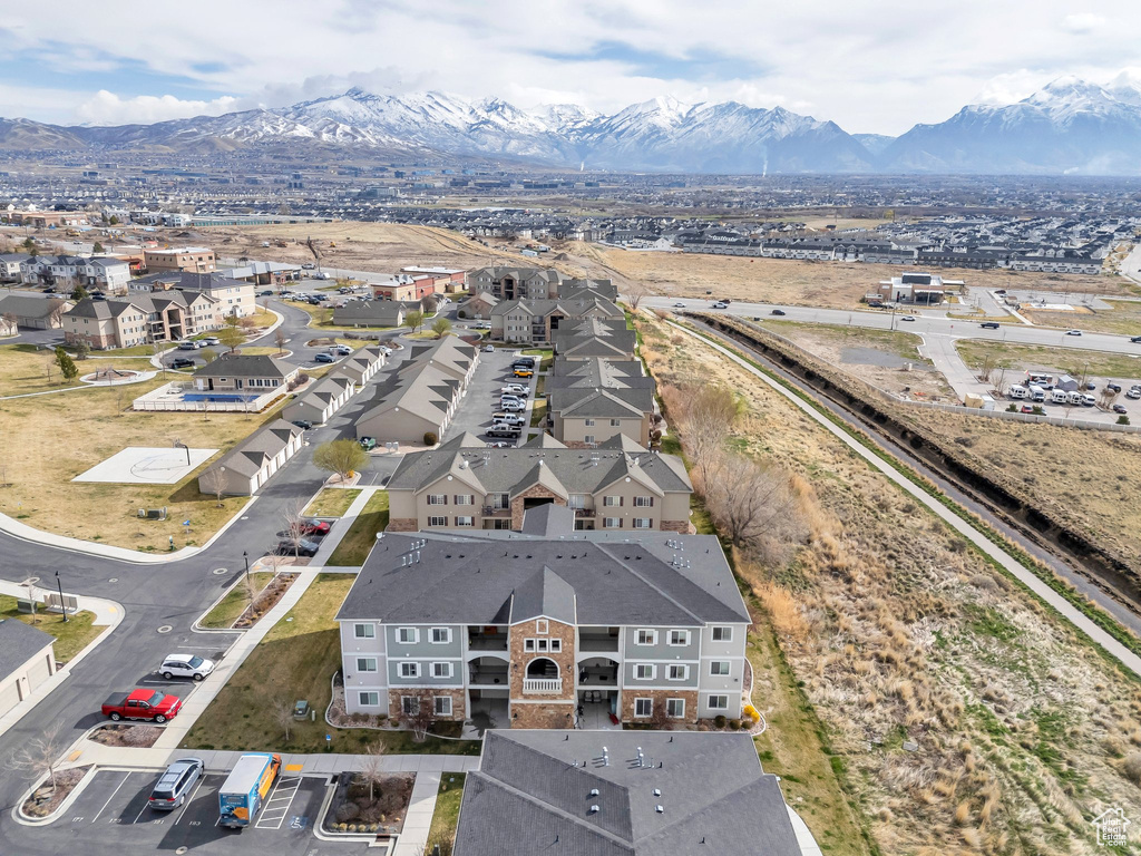 Aerial perspective of suburban area with a mountain backdrop