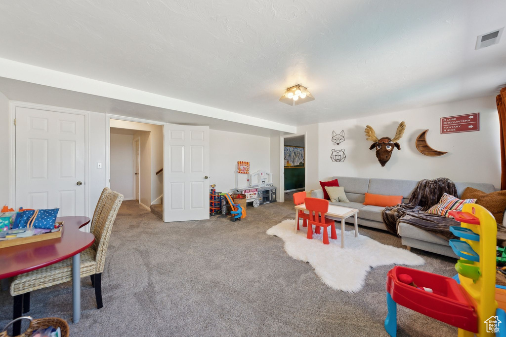 Living room featuring carpet floors