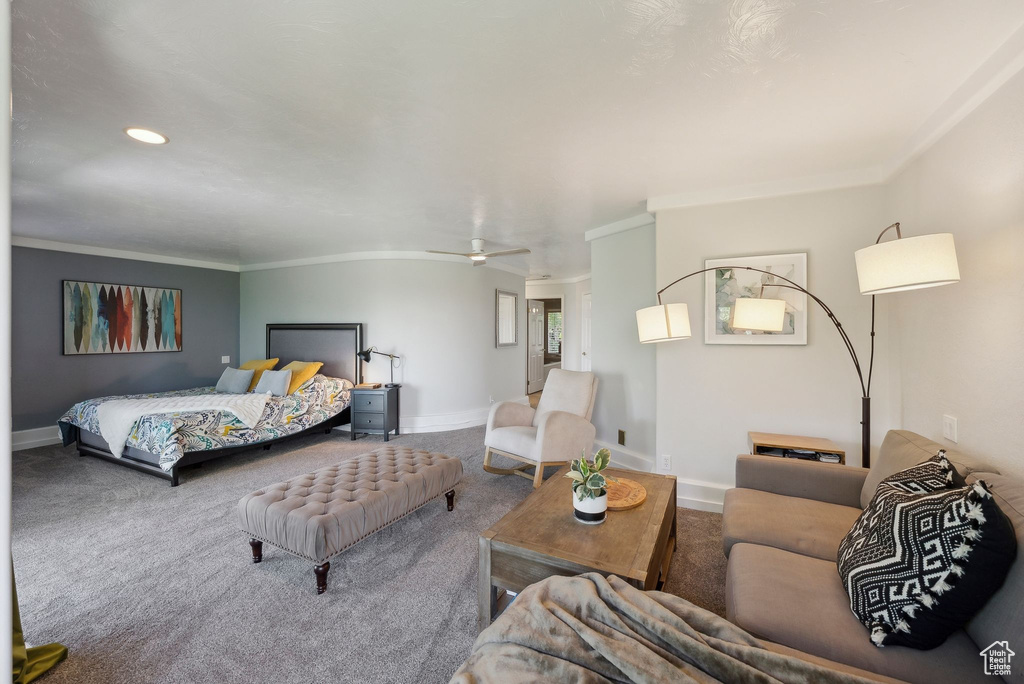 Bedroom with carpet flooring, baseboards, crown molding, and recessed lighting