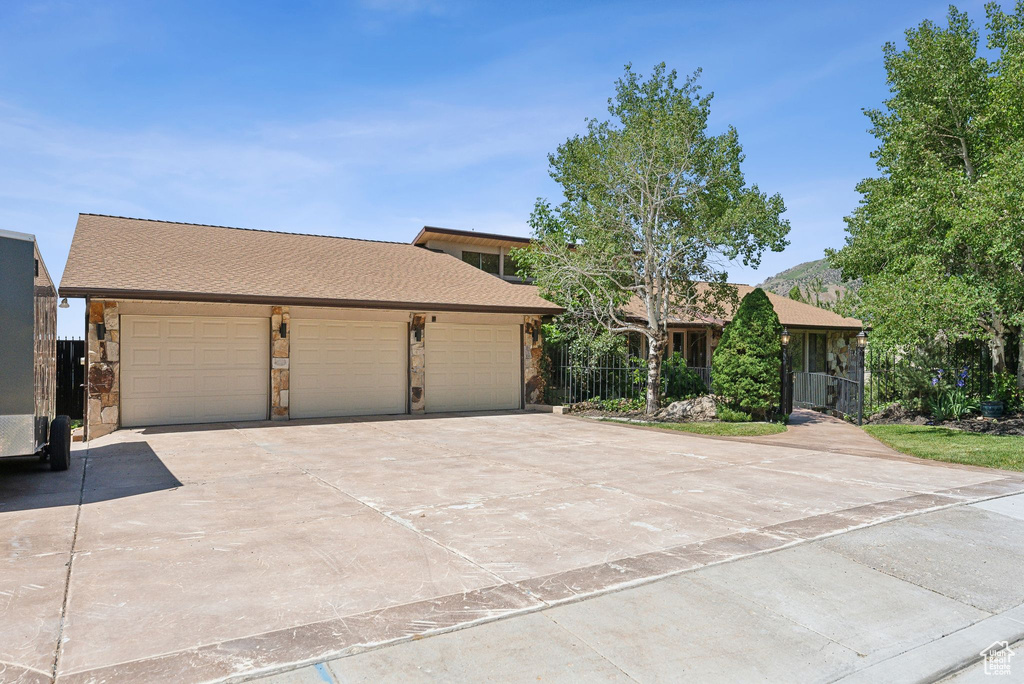 View of front of home featuring concrete driveway