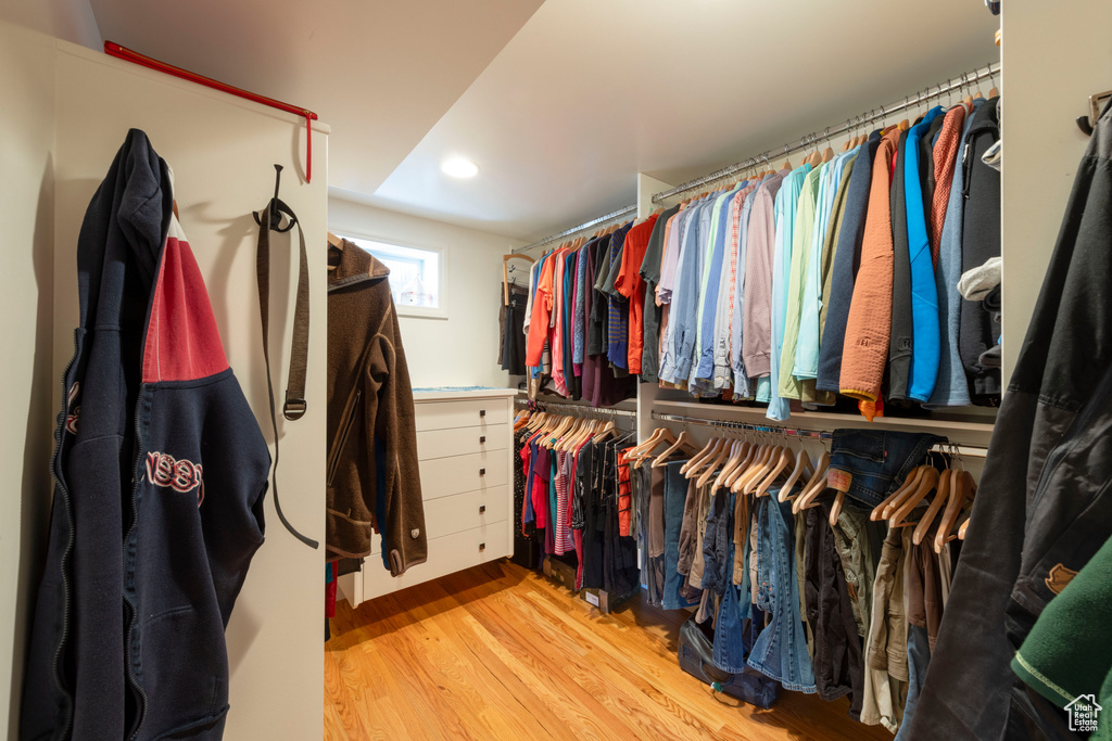 Spacious closet with wood finished floors