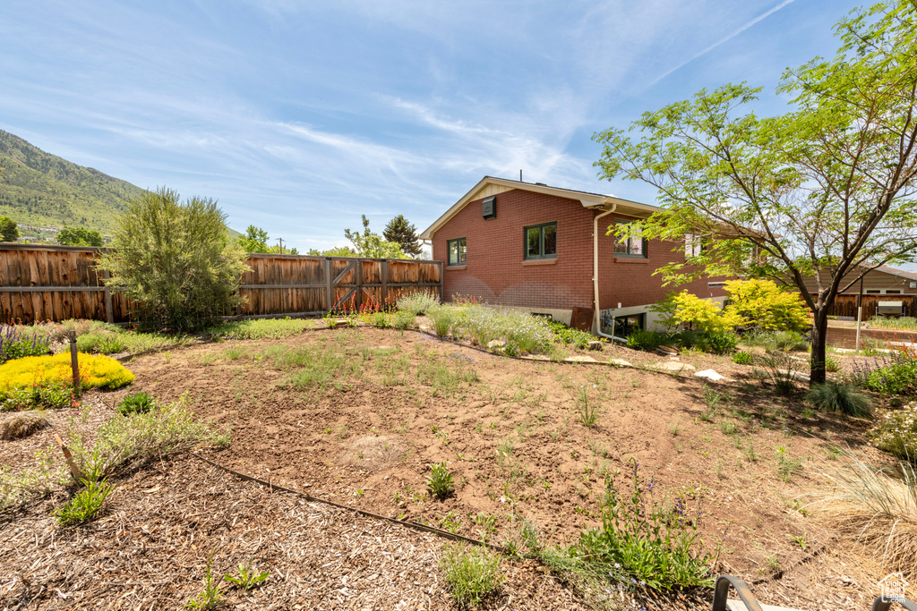 View of fenced backyard