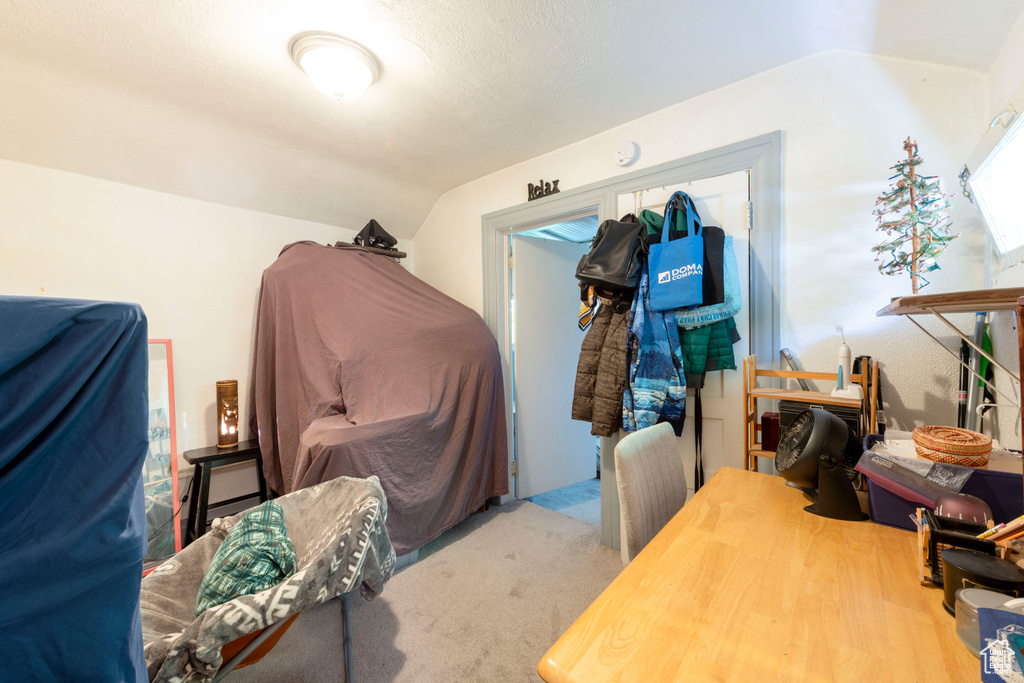 Interior space featuring lofted ceiling