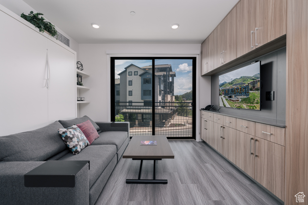 Living area featuring light wood-style flooring