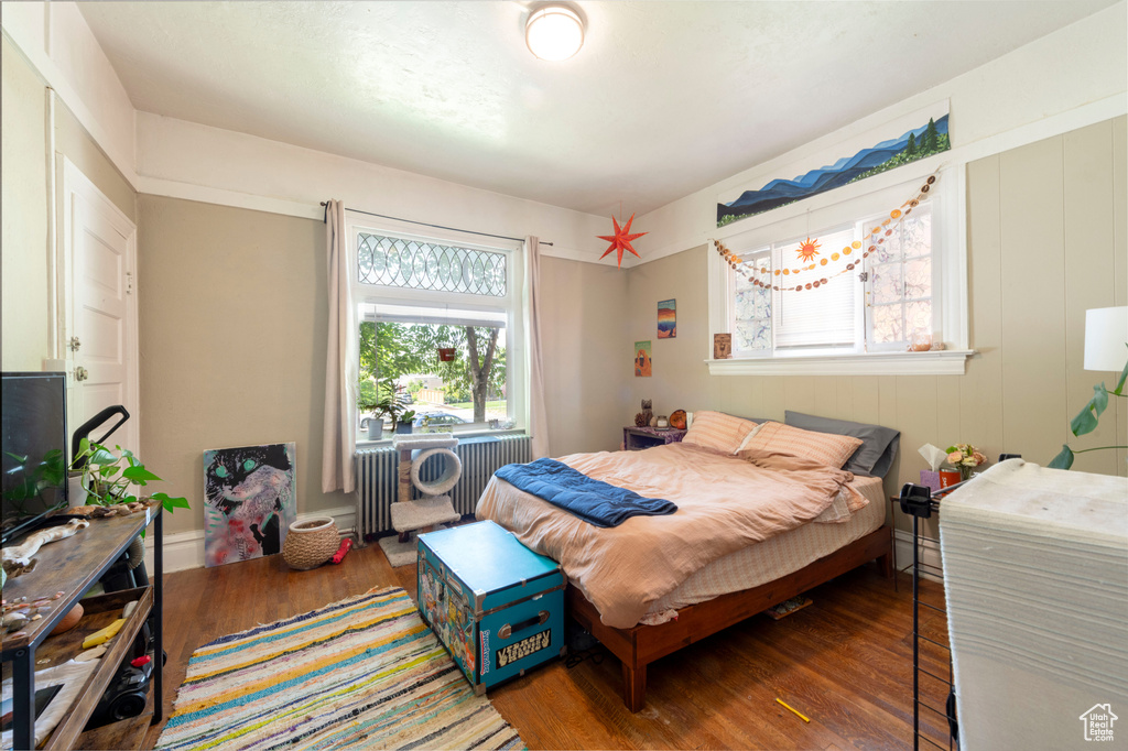 Bedroom with wood finished floors