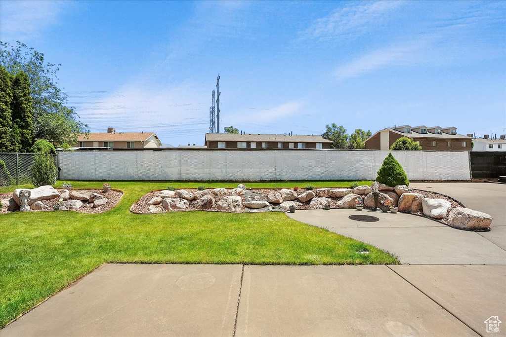 View of yard with a patio area