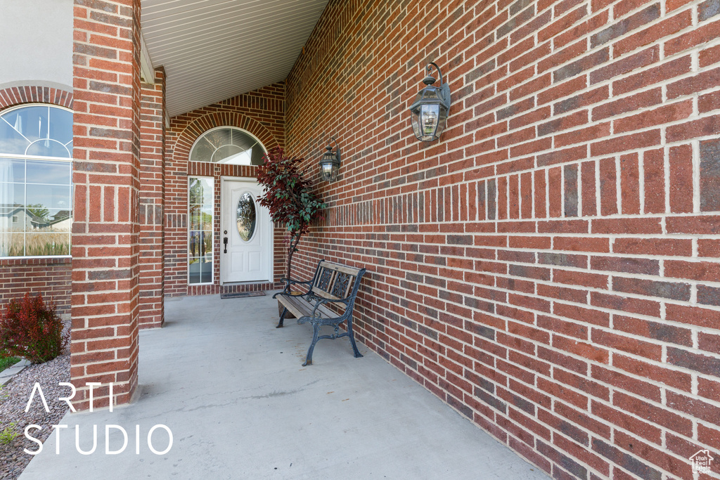 Property entrance with brick siding