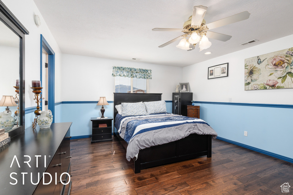 Bedroom with wood finished floors, ceiling fan, baseboards, and recessed lighting