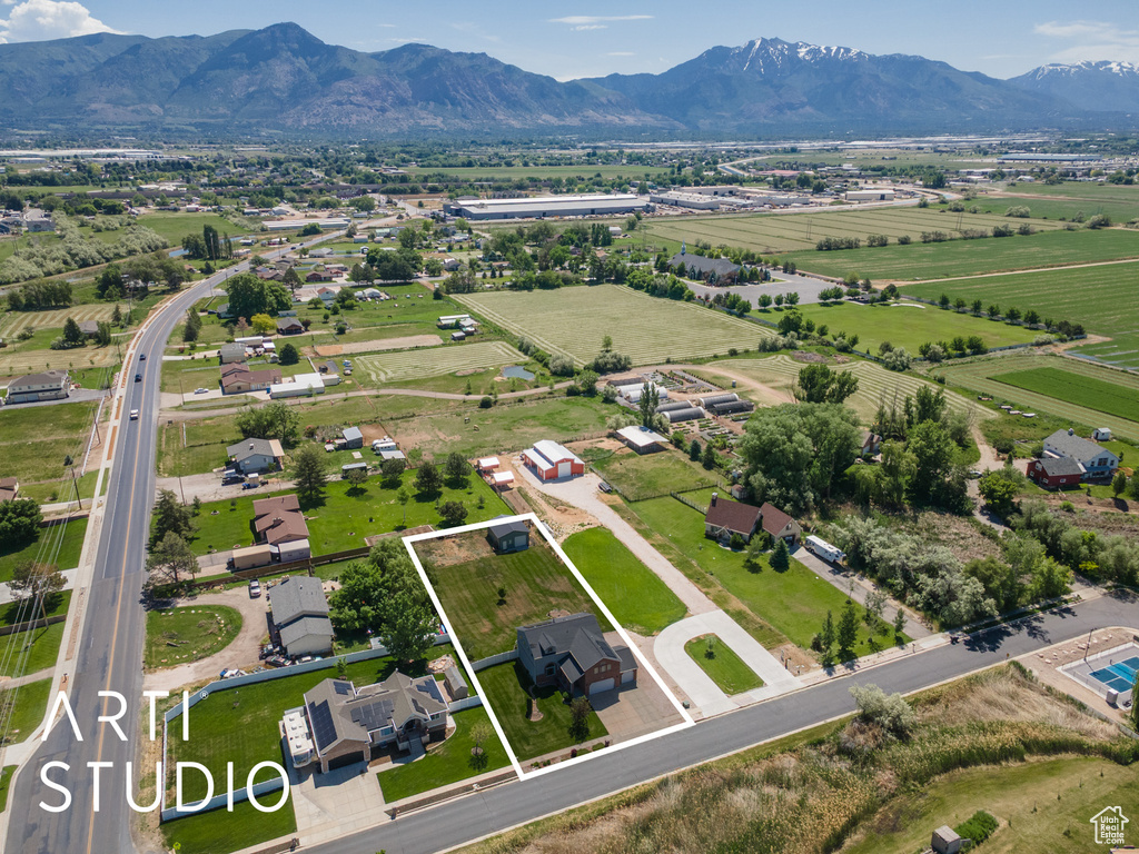 View of rural area featuring property parcel outlined and mountains