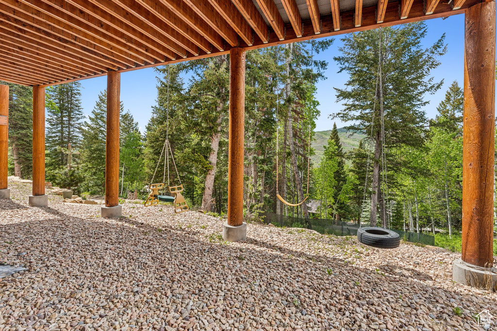 View of yard featuring a mountain view and view of scattered trees