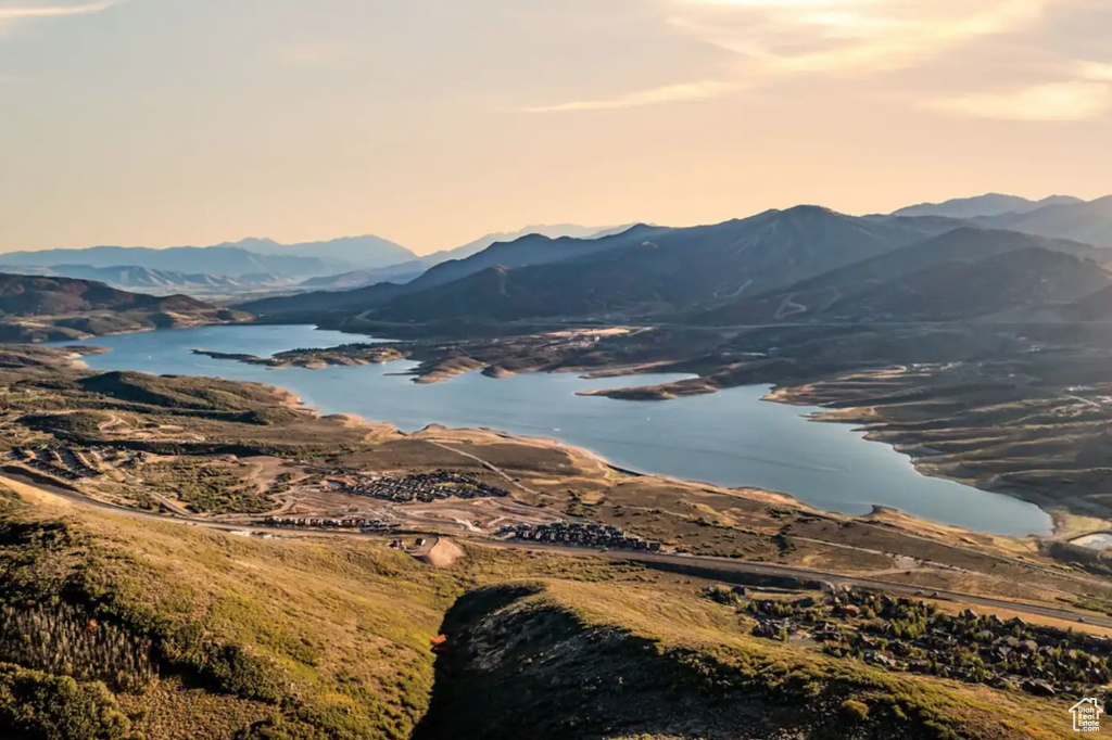 View of mountain backdrop with a nearby body of water