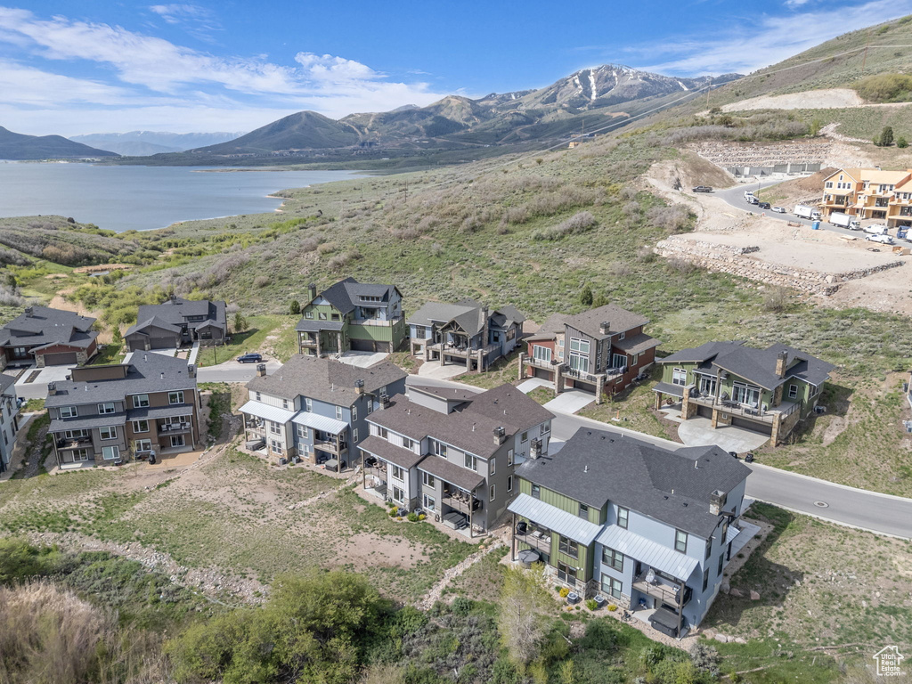 Aerial view of residential area with a water and mountain view