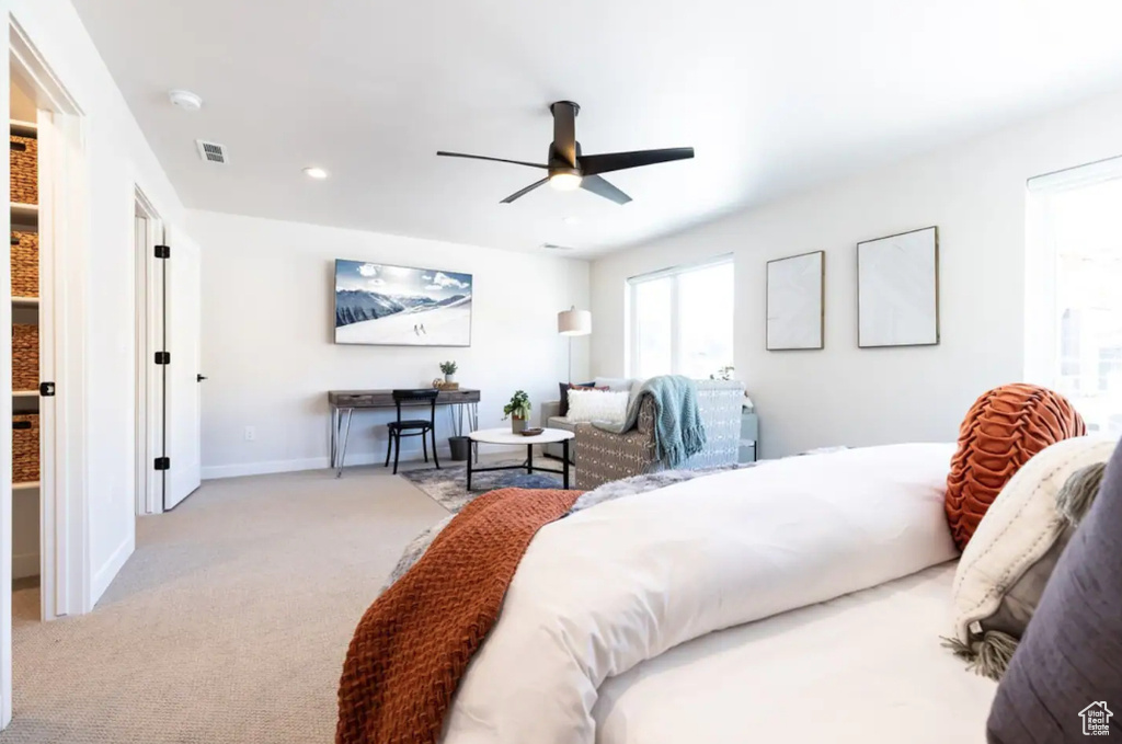 Bedroom with carpet flooring, baseboards, a ceiling fan, and recessed lighting