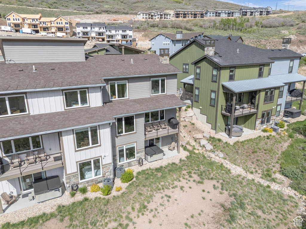 Aerial view of residential area featuring mountains
